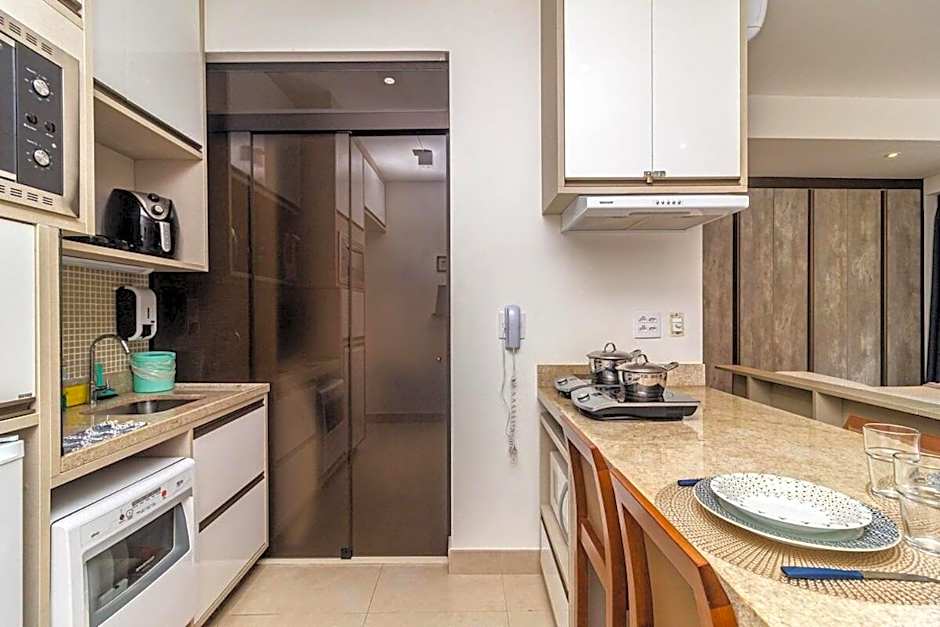 Studio moderno em condomínio de luxo pé na areia