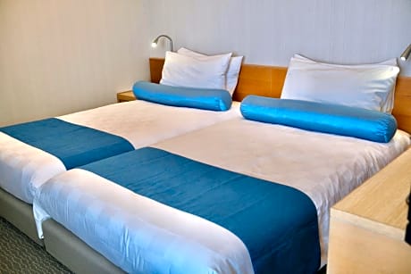 Twin Room with Sofa Bed and Balcony - Non-Smoking