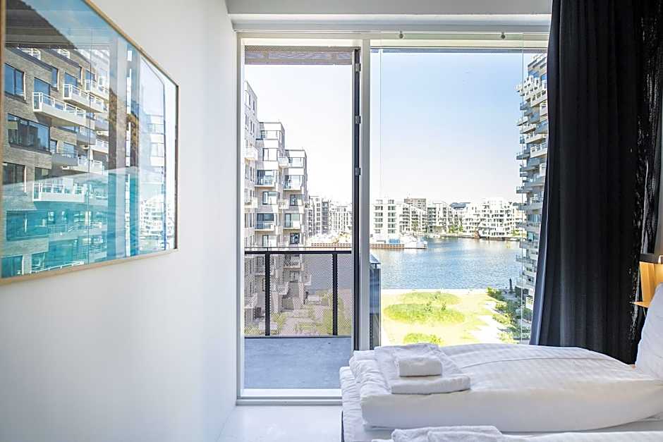 By The Pier Apartments Into This Place