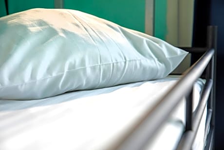 Single Bed in Female Dormitory Room