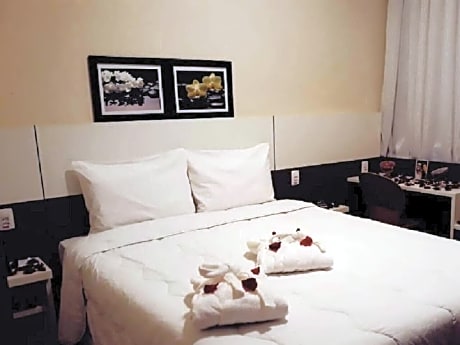 Triple Deluxe in Double Bed with couch