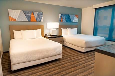 One-Bedroom Suite with Two Queen Beds with Sofa Bed, Kitchen and Tub - Disability Access