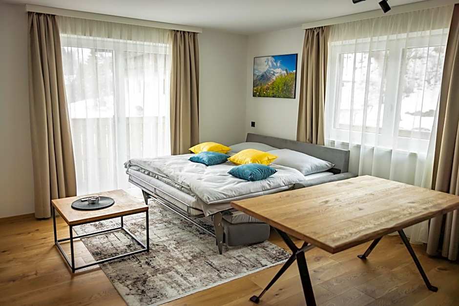 RIVERSIDE RAURIS APARTMENTS