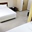 Capital O 90897 Island City Hotel