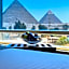 Turquoise Pyramids & Grand Egyptian museum view Hotel