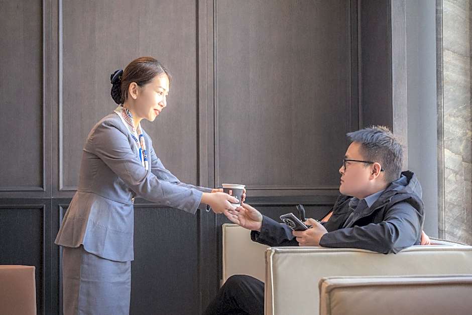 Rezen Dong Hotel Zhuanghe Wanda Plaza
