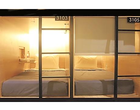 Single Bed in Dormitory Room