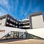 Essence Inn Marianos Hotel
