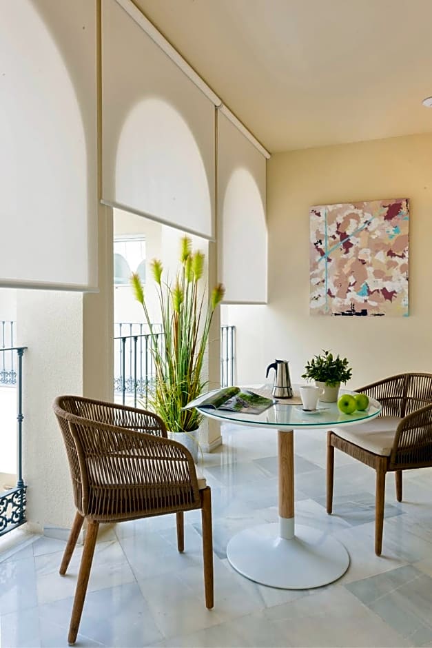 Suites Sevilla Plaza