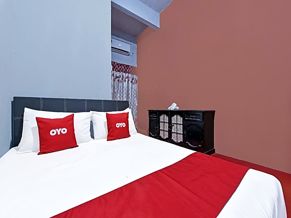 Capital O 90664 Rabi Hotel