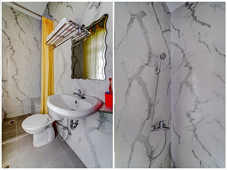 SPOT ON 91186 Losmen Yanti