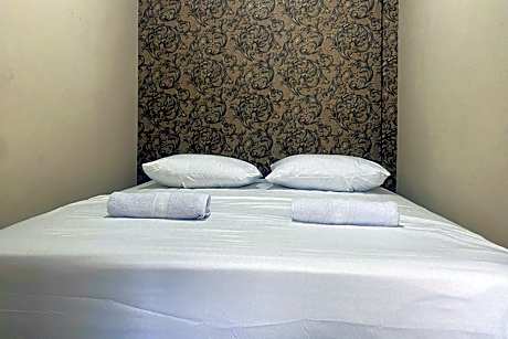 CK Homestay Syariah near Lippo Plaza Jambi Mitra RedDoorz