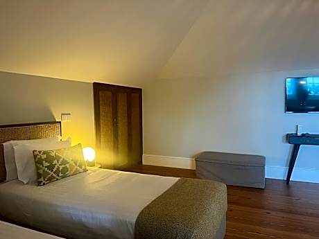 Single Bed in Dormitory Room