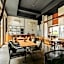 White Wall Riverfront Hotel