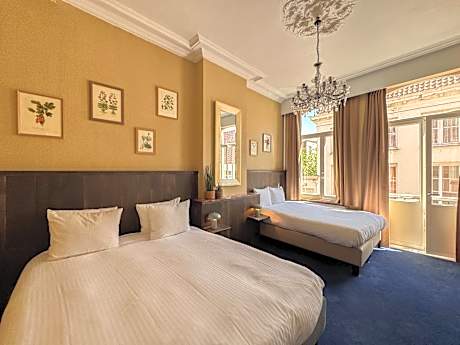 Quadruple Room (2 Adults + 2 Children)