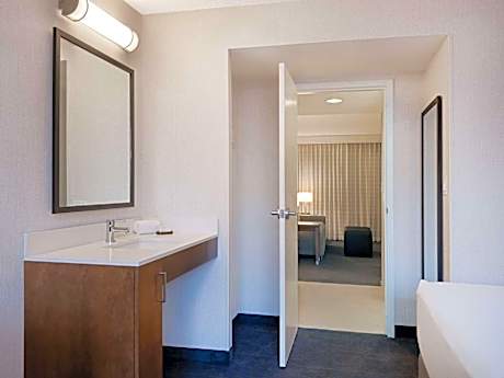 Two Room Corner Suite with Two Double Beds and Sofa bed