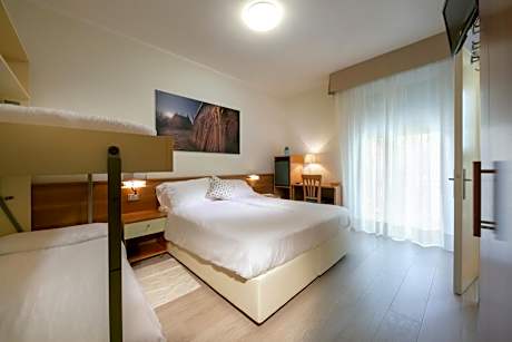 Quadruple Room (2 Adults + 2 Children)