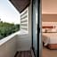 Expo Satelite 2750 Hotel & Suites