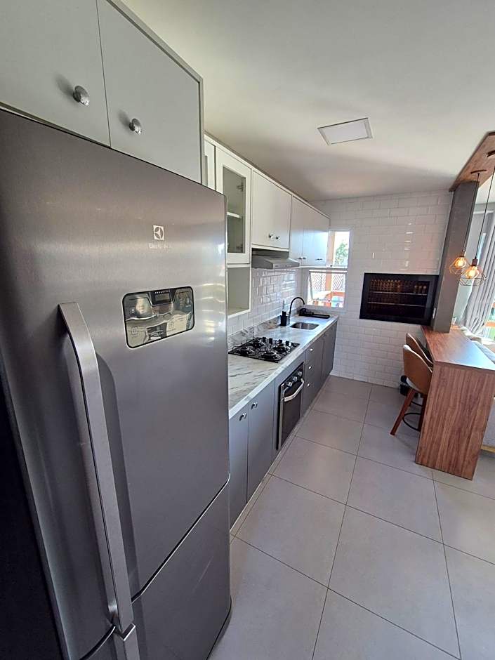 Casa no segundo andar na Praia da Cal com ar e sacada