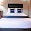 Capital O Hotel Villa Azura