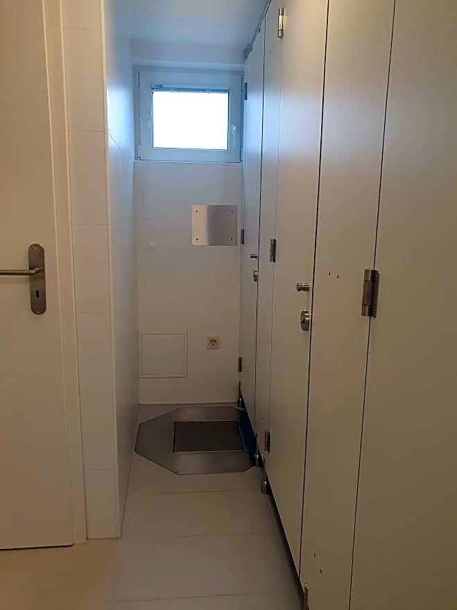 Fully equipped SIX BEDROOM HOUSE 15 kilometers from Lake Bled - with a terrace, garden, playground, and parking