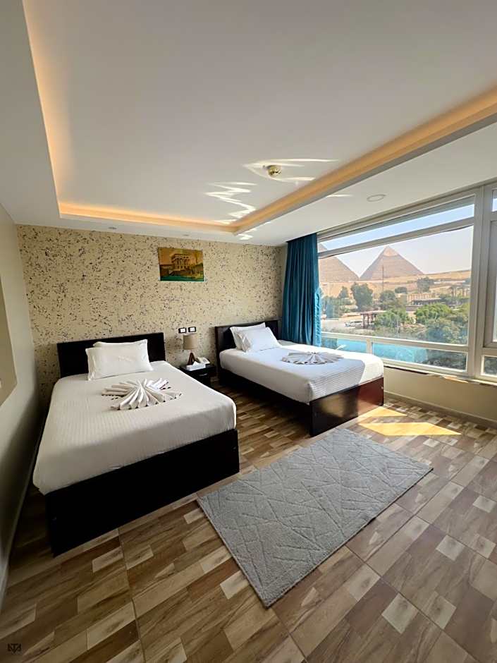 Turquoise Pyramids & Grand Egyptian museum view Hotel