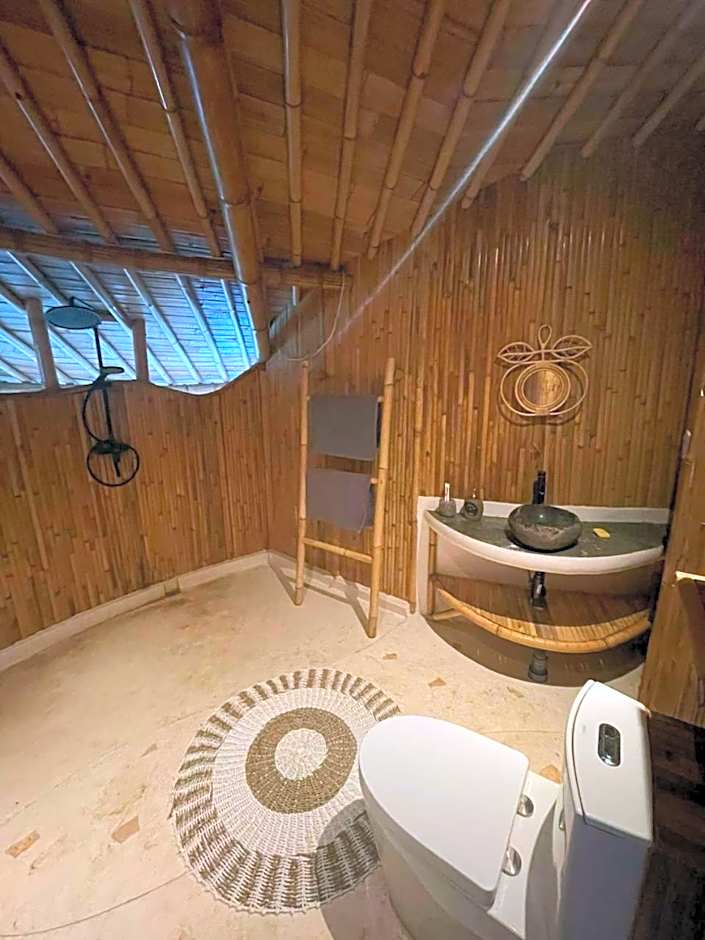 Kini Resort - Luxury Beachfront Bamboo Resort