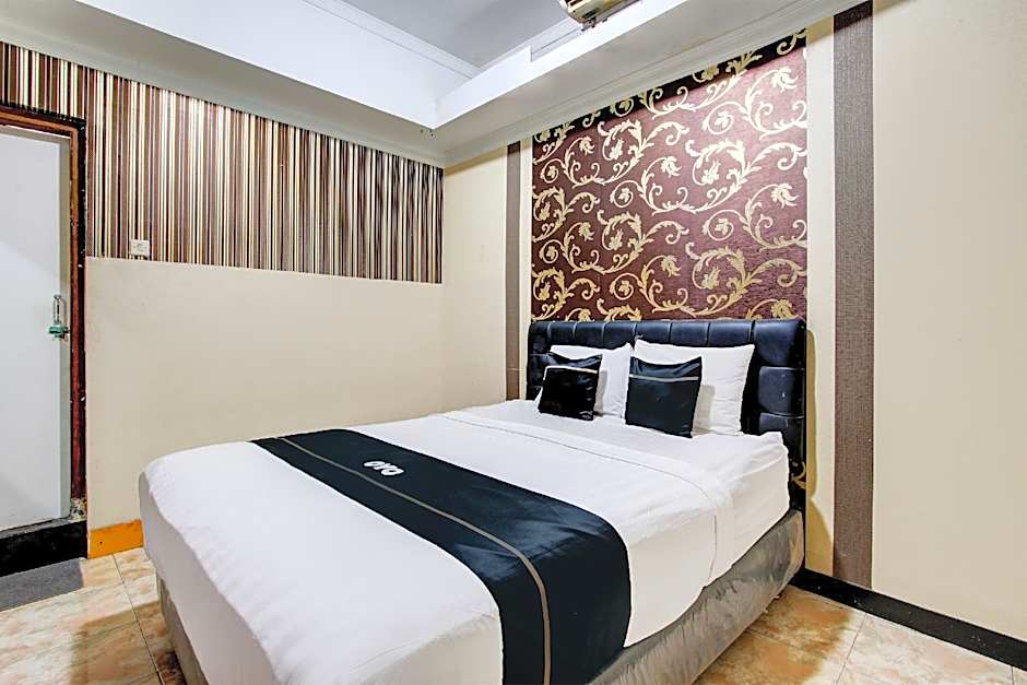 Capital O 93653 Kinasih Hotel