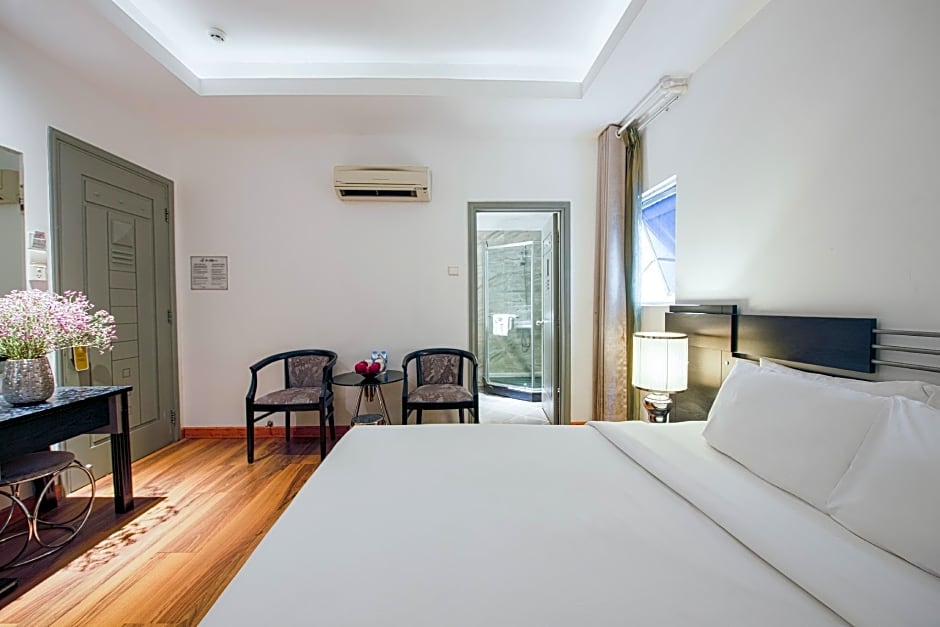 A & Em Corp - The Petit Hotel