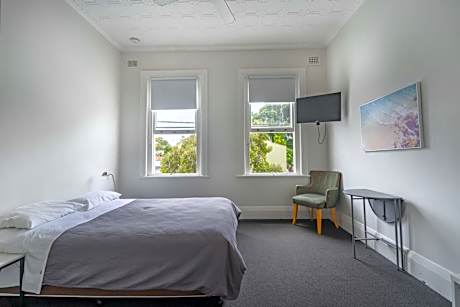 Queen Room with Shared Bathroom