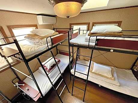 Bunk Bed in Female Dormitory Room with Shared Bathroom