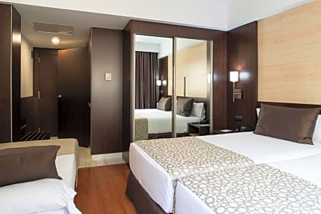 Triple Room (2 Adults + 1 Child)