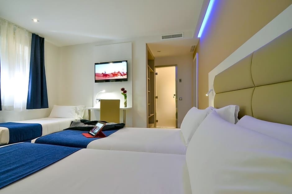 Photo 1 of 7 of Triple Room