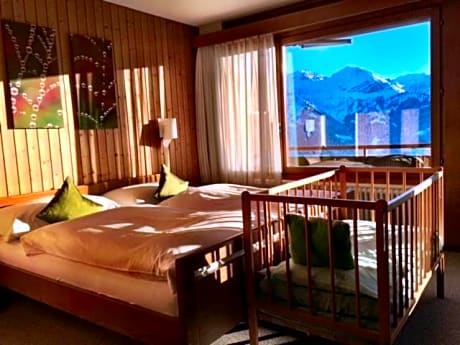 Family Room with Balcony and Lake and Mountain View