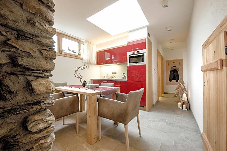 Hotel Norica - Thermenhotels Gastein mit dem Bademantel direkt in die Therme