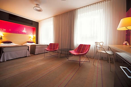 Comfort room with two single beds