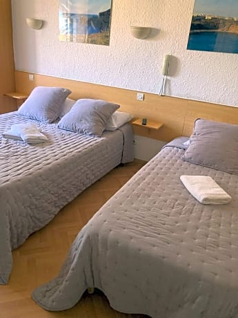 Triple Room (2 Adults + 1 Child)