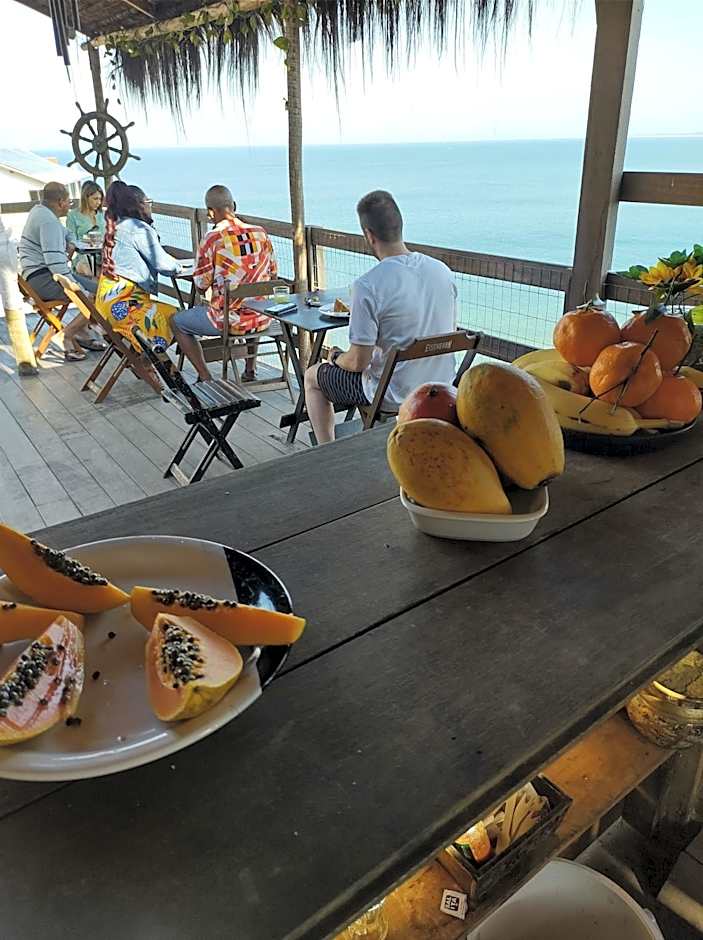 Pousada Marambaia Café - Praiana, econômica, Com café da manhã, piscina ao ar livre e hidromassagem aquecida -Frente para o mar