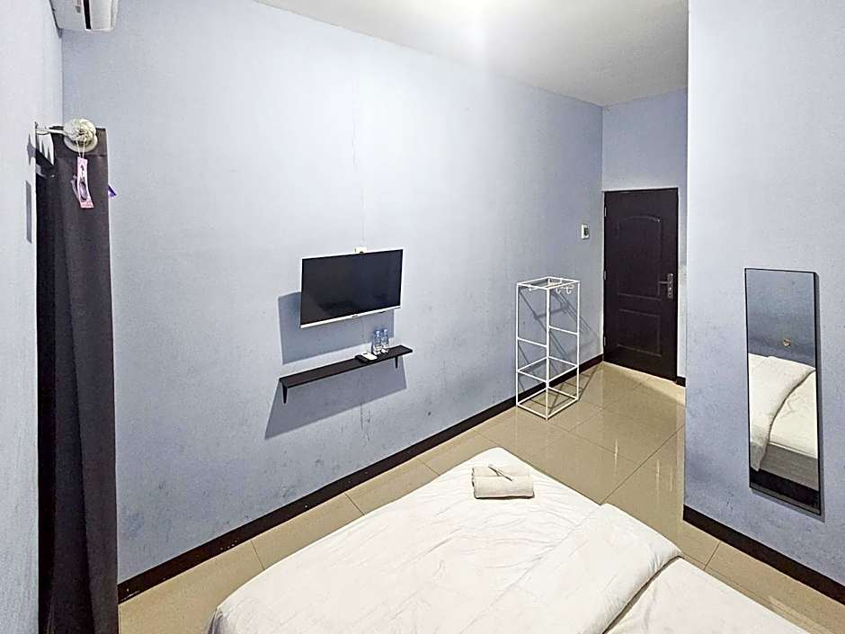 Homestay Sido Joyo near Sunrise Mall Mitra RedDoorz