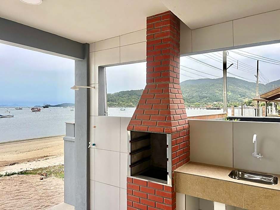 Pé na areia! Aconchegante casa frente Mar! CO02I