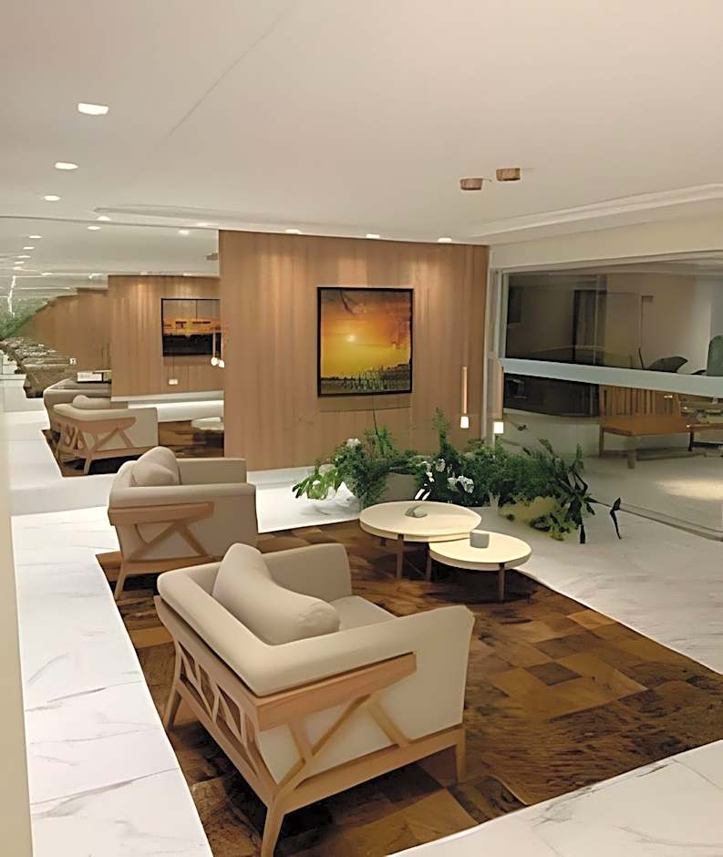 Apartamentos aconchegantes frente mar