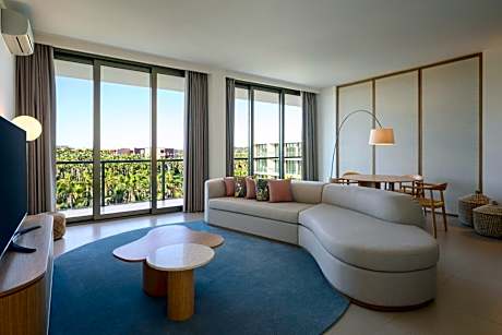 Junior King Suite with Balcony and Pool View