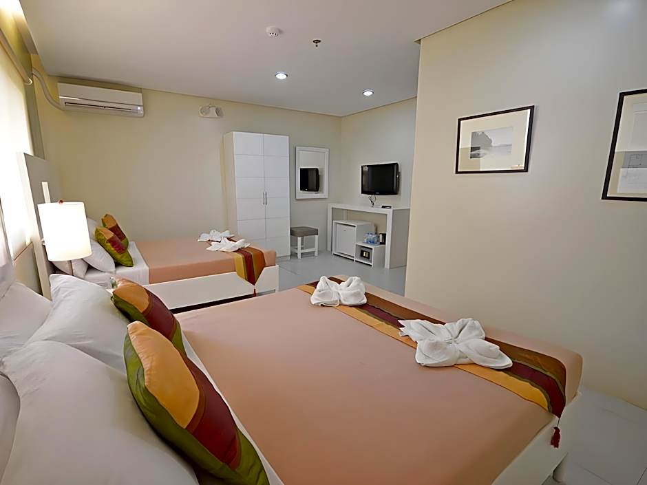 Holiday Suites Business District - Formerly Empire Suites Hotel