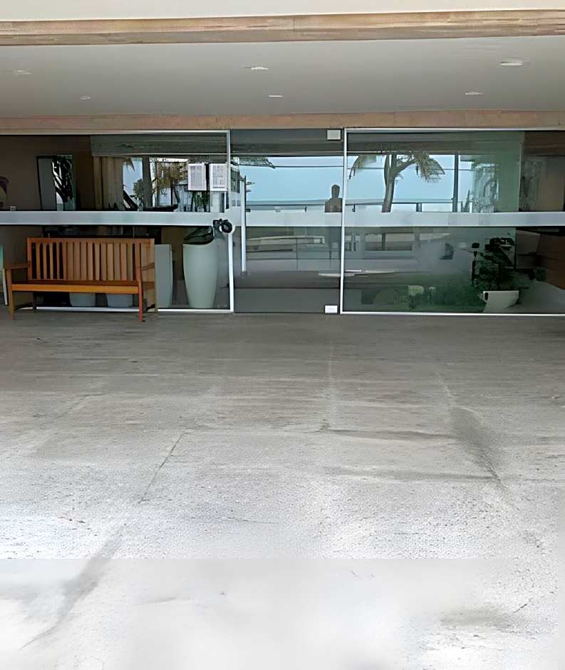 Apartamentos aconchegantes frente mar