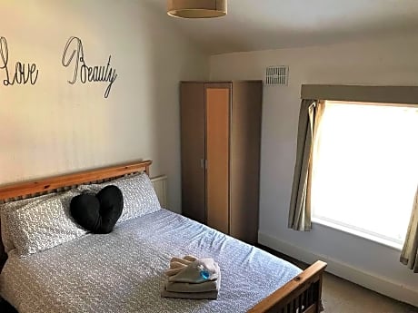 Quadruple Room with Shared Bathroom