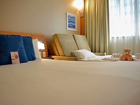 Superior Room with double bed  sofa bed and side sea view