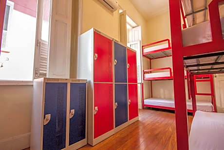 Bed in 9-Bed Dormitory Room with External Shared Bathroom