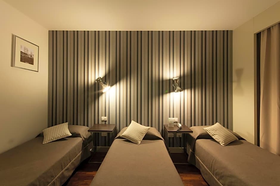 Photo 1 sur 11 de Triple Room