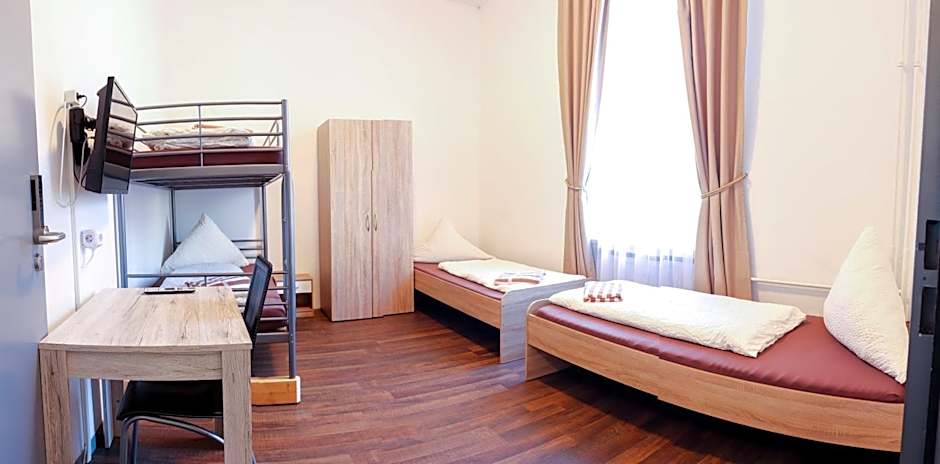 Photo 1 of 8 of Quadruple Room with Shared Bathroom