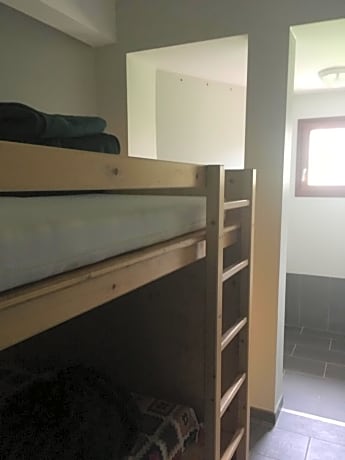 Single Bed in Dormitory Room